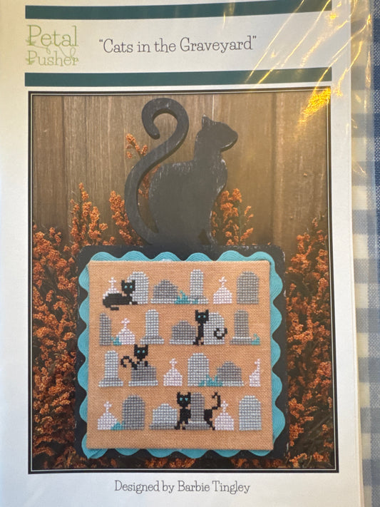 Cats in the graveyard